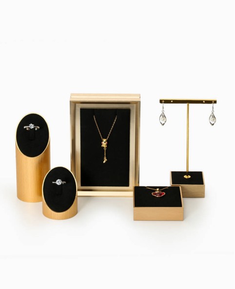 Conjuntos de exibição de joias de luxo em aço inoxidável dourado de veludo preto para venda
