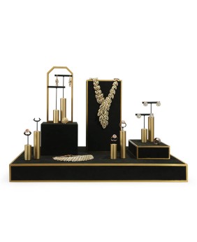 دعائم عرض مجوهرات من الفولاذ المقاوم للصدأ باللون الأسود والذهبي الإبداعي للبيع