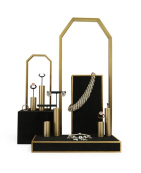 Conjuntos de exhibición de joyería de acero inoxidable de oro negro de diseño creativo para la venta