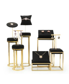 Soportes de exhibición de joyería de acero inoxidable dorado de terciopelo negro premium