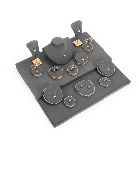 Set di espositori per gioielli in metallo dorato e velluto grigio scuro