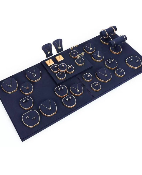Marineblauwe fluwelen gouden metalen sieradenvitrine-displaysets