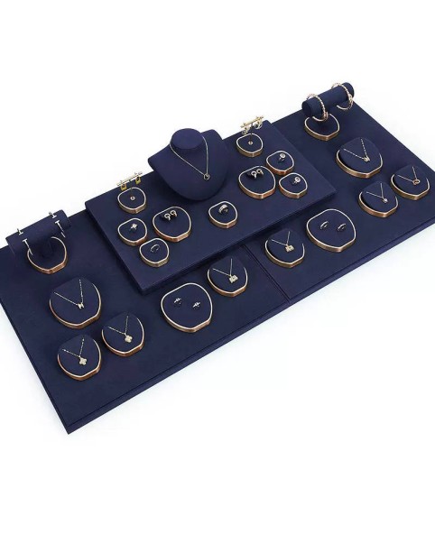 Marineblauwe fluwelen gouden metalen sieradenvitrine-displayset