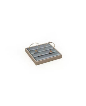 Vassoio espositore con anello per slot in pelle grigio scuro con finiture dorate