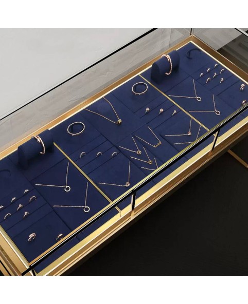 Bandeja de exhibición de joyas con adornos dorados de terciopelo azul marino de lujo