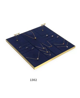Conjunto de exibição de joias de veludo azul marinho com acabamento dourado luxuoso para venda