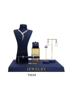 Conjunto de exhibición de joyería de metal dorado de terciopelo azul marino al por menor de lujo