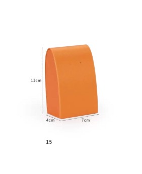 Luxe oranje lederen oorbellen displaystandaard