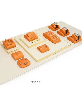 Nuevo juego de bandejas de exhibición de joyería naranja y crema de primera calidad