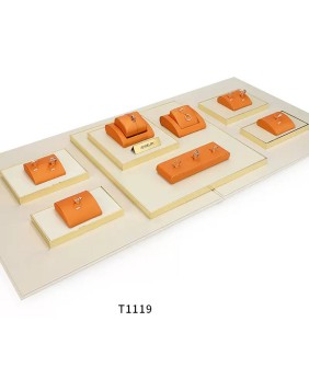 Conjunto de exibição de vitrine de joias laranja e creme para varejo