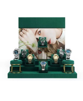 Conjuntos de exhibición de escaparate de reloj de terciopelo verde oscuro de metal dorado de lujo a la venta