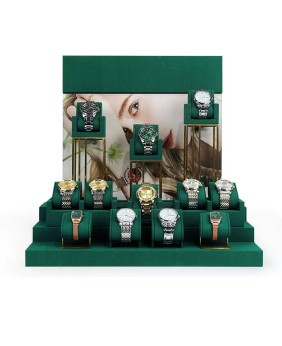 Conjuntos de exhibición de relojes de terciopelo verde oscuro de metal dorado premium